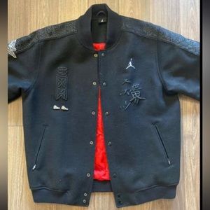 Black Jordan jacket with red interior lining